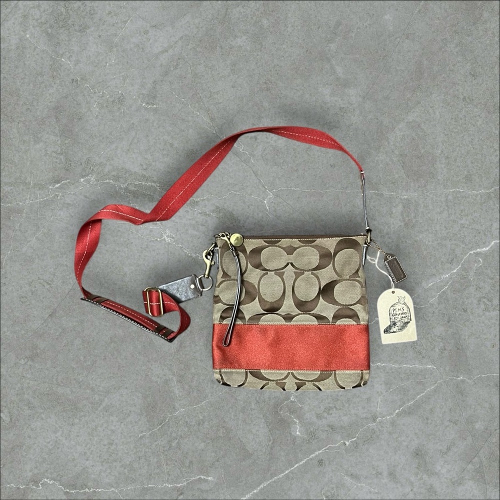 Red Accent Tan Monogram Coach Bag